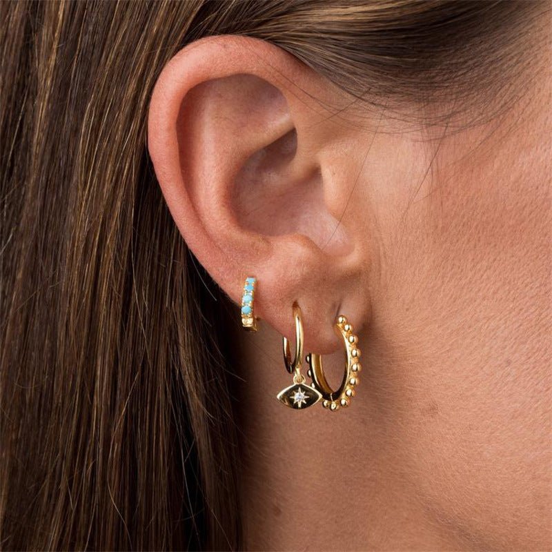 Evil Eye Sapphire Huggie Earrings - Camile & Stone